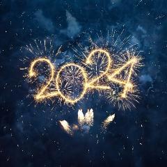 The number 2024 written in sparks across a dark background 