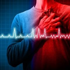A man clutching his chest 