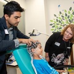 Dr Kartik Lyer (L) and Associate Professor Karen Barlow (R) in the KidStim Lab