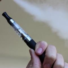 man smoking an e-cigarette 