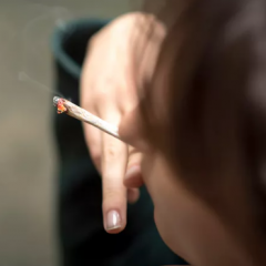 Person smoking a cigarette