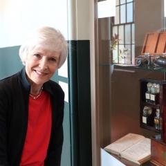 Dr Ann jackson next to Sandford Jackson’s travelling chest