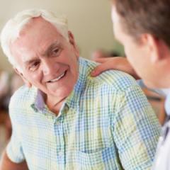 Older man with doctor