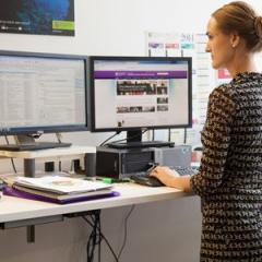 Women standing at desk