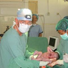 Dr Miller's surgical work for OSSAA in West Timor - cesarean section delivery, 2005