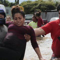 Pregnant mother in flood