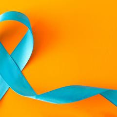 teal ribbon on an orange background