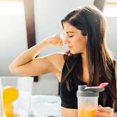Woman in flexing arm