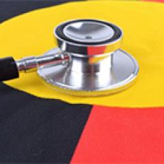 Image of stethoscope on Indigenous flag