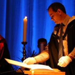 Reading names from the Book of Remembrance at the 2014 UQ Thanksgiving Ceremony.
